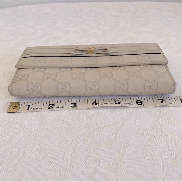 GUCCI Guccissima Bow Signature Wallet - Picture 13 of 14